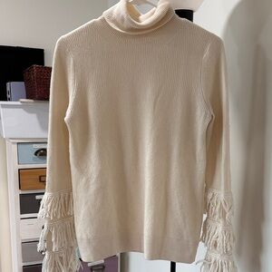 Cream Turtleneck Sweater with Fringe Sleeves